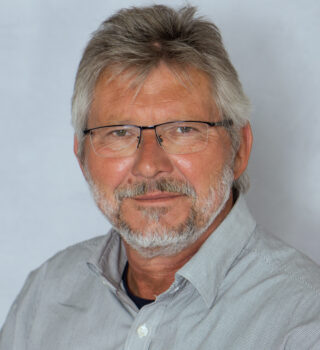 Heinz-Hermann Kickler. Ein Mann mit grauen Haaren. Er trägt eine Brille